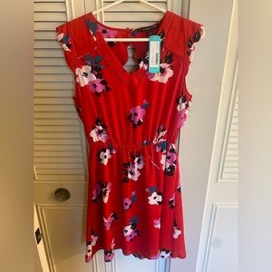 41 Hawthorn red floral dress with scalloped sleeve and open back.